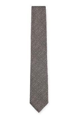Corbata en jacquard de seda confeccionada en Italia con efecto mouliné