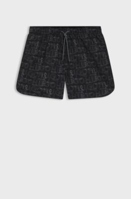 Badeshorts mit saisonalem Print und abgerundetem Saum, Grau