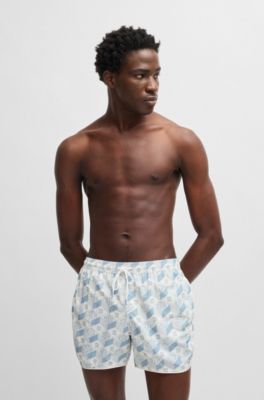 Badeshorts mit saisonalem Print und abgerundetem Saum, Hellblau
