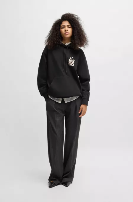 Relaxed-fit hoodie in French terry with seasonal artwork