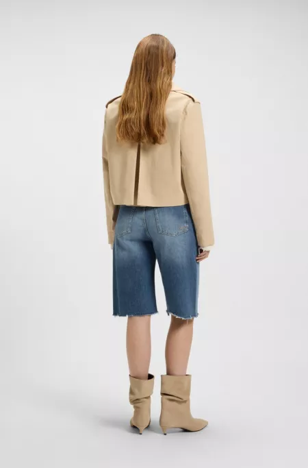 Knee-length denim shorts with raw hem