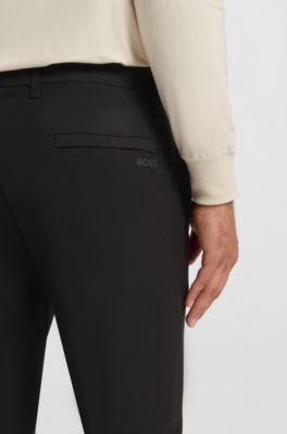 Slim-fit trousers in water-repellent stretch fabric, Black
