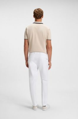 Pantalones slim fit de tejido el&aacute;stico repelente al agua, Blanco