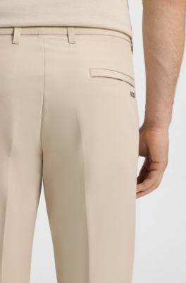 Slim-fit trousers in water-repellent stretch fabric, Beige