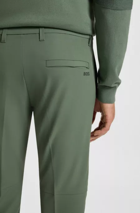 Slim-fit trousers in water-repellent stretch fabric