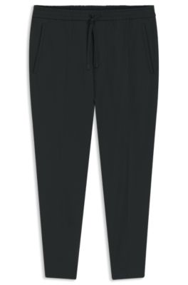 Tapered-fit trousers in water-repellent stretch fabric, Black