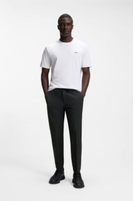 Pantalones tapered fit de tejido el&aacute;stico hidr&oacute;fugo, Negro