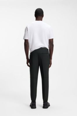 Pantalones tapered fit de tejido el&aacute;stico hidr&oacute;fugo, Negro