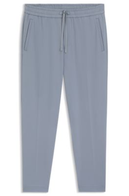 Tapered-fit trousers in water-repellent stretch fabric, Grey