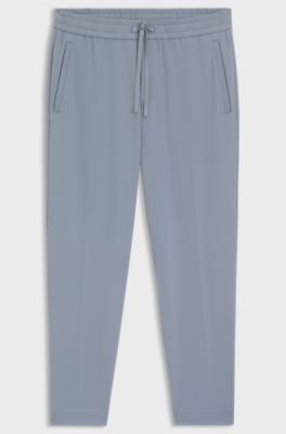 Tapered-fit trousers in water-repellent stretch fabric, Grey