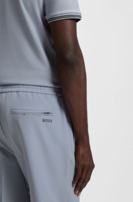 Pantalon Tapered en tissu stretch d&eacute;perlant, Gris