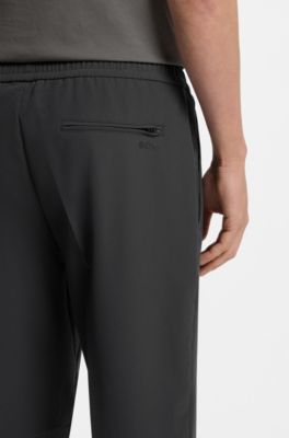 Tapered-fit trousers in water-repellent stretch fabric, Dark Grey