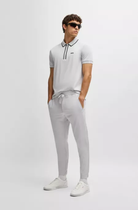 Tapered-fit trousers in water-repellent stretch fabric