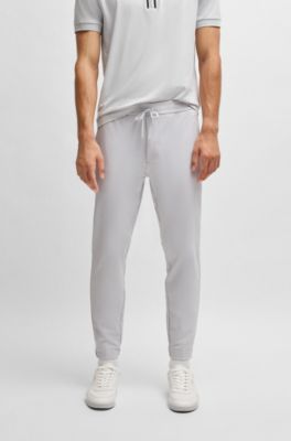 Tapered-fit trousers in water-repellent stretch fabric, Light Grey