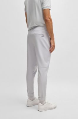 Tapered-fit trousers in water-repellent stretch fabric, Light Grey