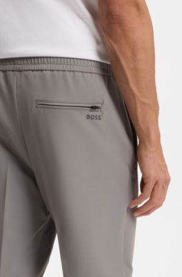 Pantalon Tapered en tissu stretch d&eacute;perlant, Gris sombre