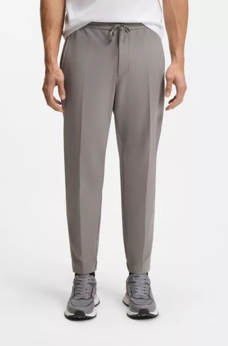Tapered-fit trousers in water-repellent stretch fabric