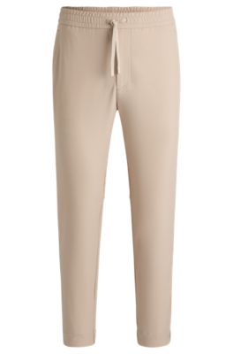Tapered-fit trousers in water-repellent stretch fabric, Beige