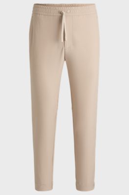 Tapered fit bukser i vandskyende stof med str&aelig;k, Beige