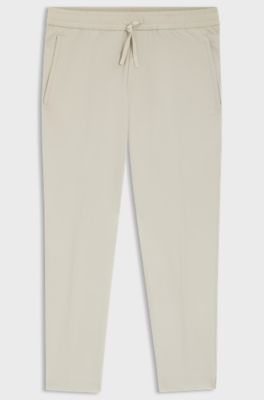 Pantaloni con fit affusolato in tessuto elasticizzato idrorepellente, Beige chiaro