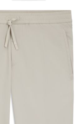 Tapered-fit trousers in water-repellent stretch fabric, Light Beige