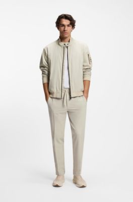Tapered-fit trousers in water-repellent stretch fabric, Light Beige
