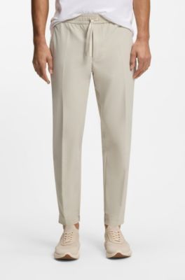 Pantaloni con fit affusolato in tessuto elasticizzato idrorepellente, Beige chiaro