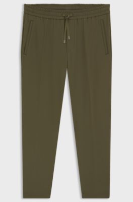 Tapered-fit trousers in water-repellent stretch fabric, Olive