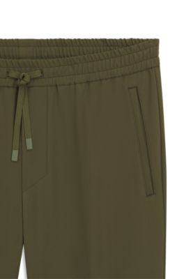 Tapered-fit trousers in water-repellent stretch fabric, Olive