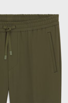 Tapered-fit trousers in water-repellent stretch fabric, Olive