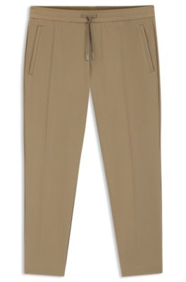 Tapered-fit trousers in water-repellent stretch fabric, Beige