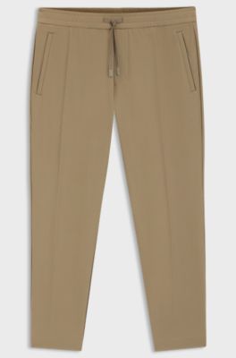 Pantalon Tapered en tissu stretch d&eacute;perlant, Beige
