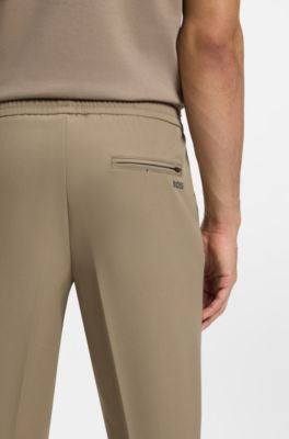 Pantalon Tapered en tissu stretch d&eacute;perlant, Beige