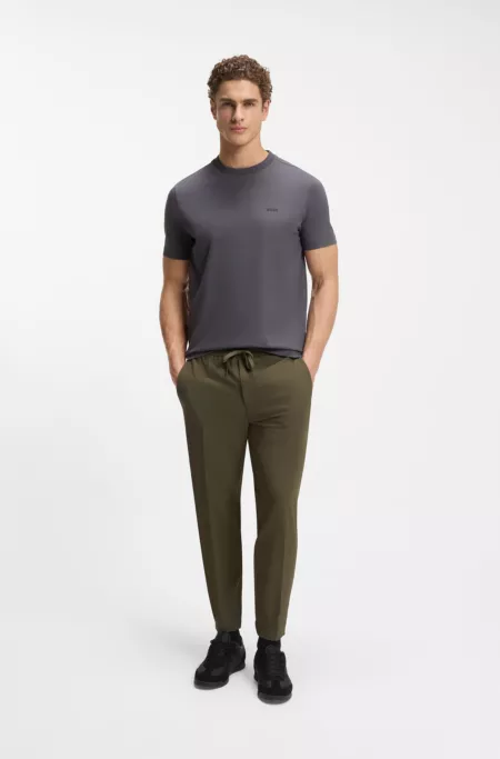 Tapered-fit trousers in water-repellent stretch fabric