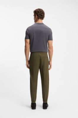 Pantaloni con fit affusolato in tessuto elasticizzato idrorepellente, Verde scuro