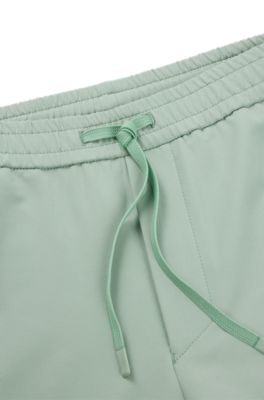 Tapered-fit trousers in water-repellent stretch fabric, Light Green