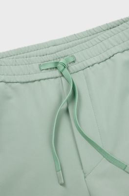 Tapered-fit trousers in water-repellent stretch fabric, Light Green