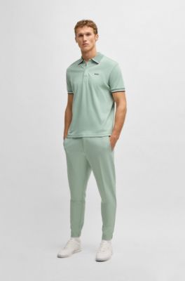 Pantalon Tapered en tissu stretch d&eacute;perlant, Chaux