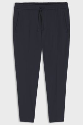 Tapered-fit trousers in water-repellent stretch fabric, Dark Blue