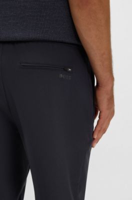 Tapered-fit trousers in water-repellent stretch fabric, Dark Blue