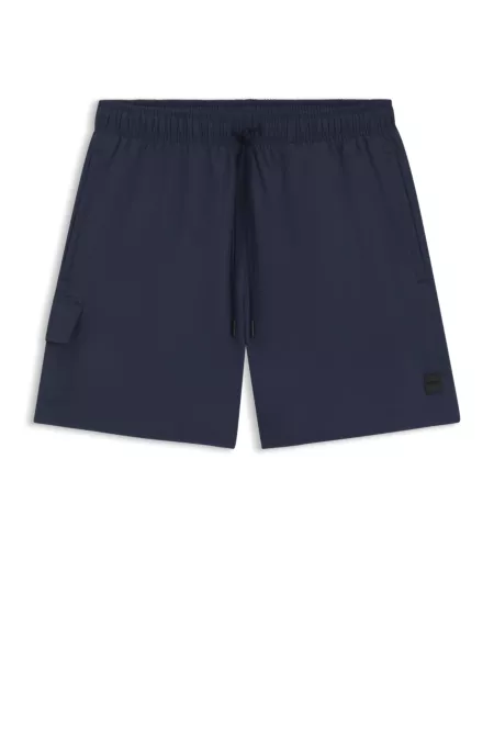 Short de bain avec poche cargo et badge logoté