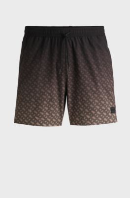 Logo-badge swim shorts with degrad&eacute; monogram print, Black