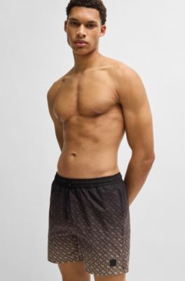 Logo-badge swim shorts with degrad&eacute; monogram print, Black