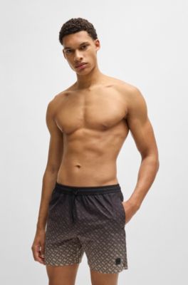 Logo-badge swim shorts with degrad&eacute; monogram print, Black
