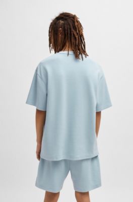 T-shirt van katoenen jersey met blauwe logopatch, Lichtblauw