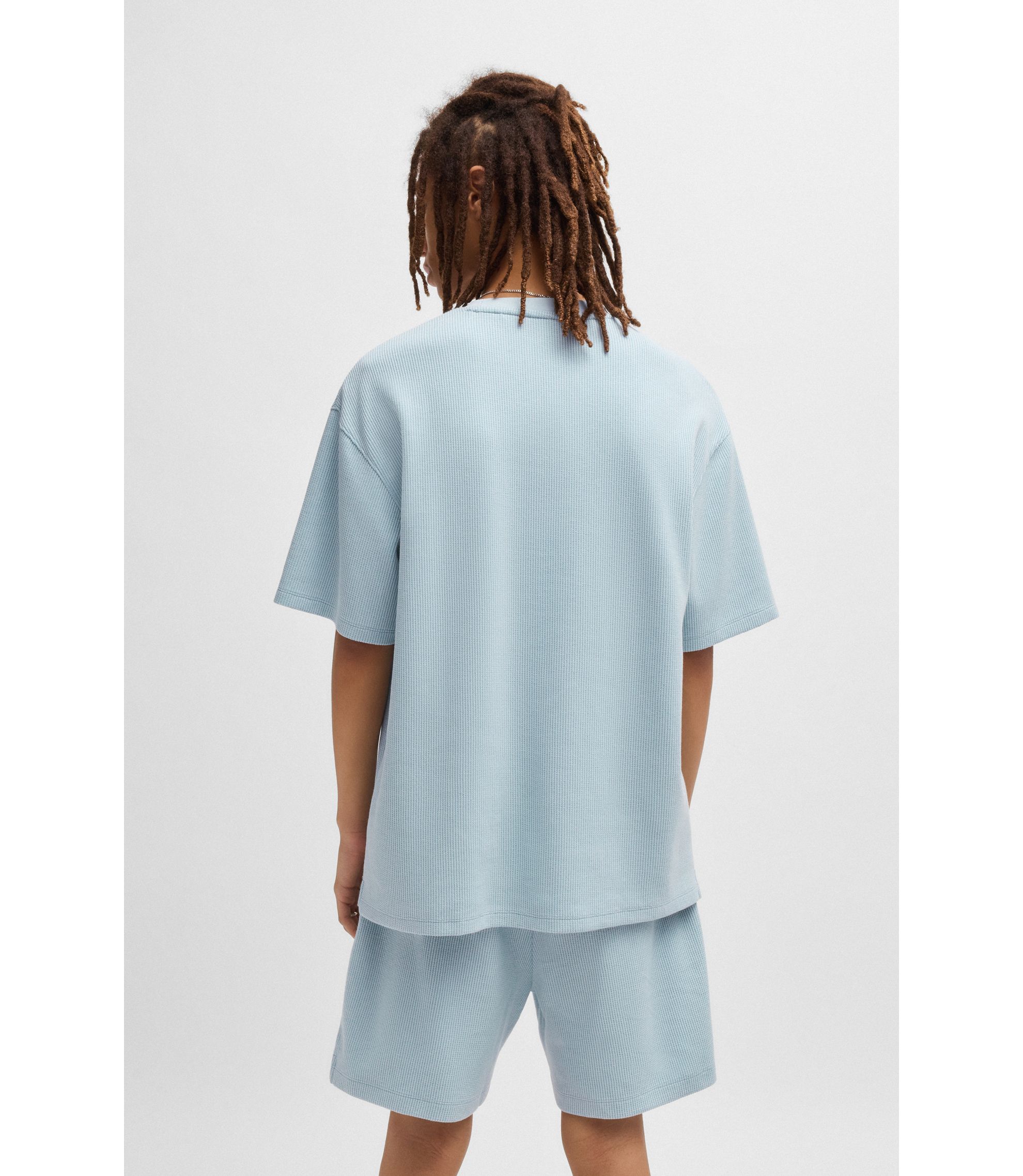 HUGO - Cotton-jersey T-shirt with blue logo patch - Light Blue