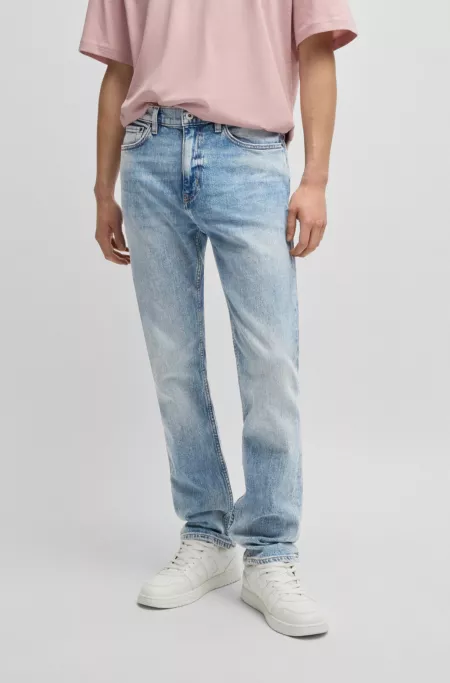 Slim-fit jeans in mid-blue tinted stretch denim