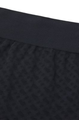 모노그램 패턴 스트레치 리브드 저지 액티브 니트 레깅스, 다크 블루