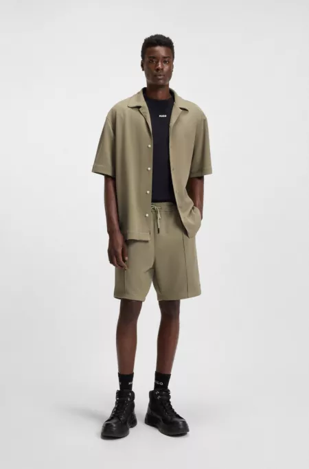 Relaxed-fit shorts in stretch Oxford fabric