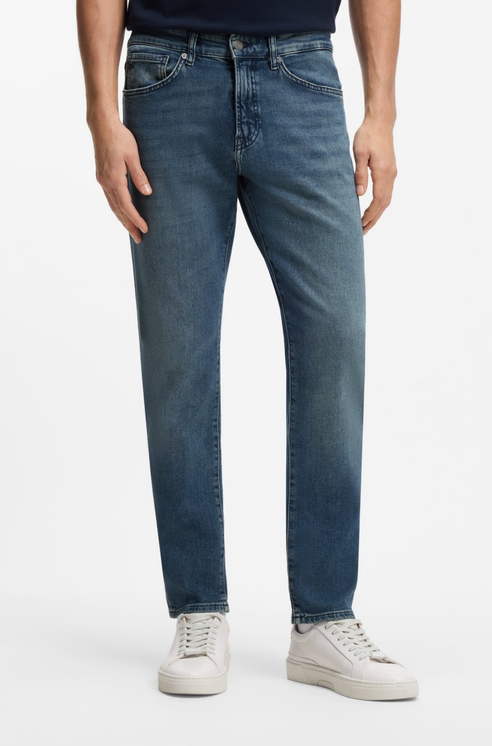 Tapered-fit jeans in washed-blue stretch denim